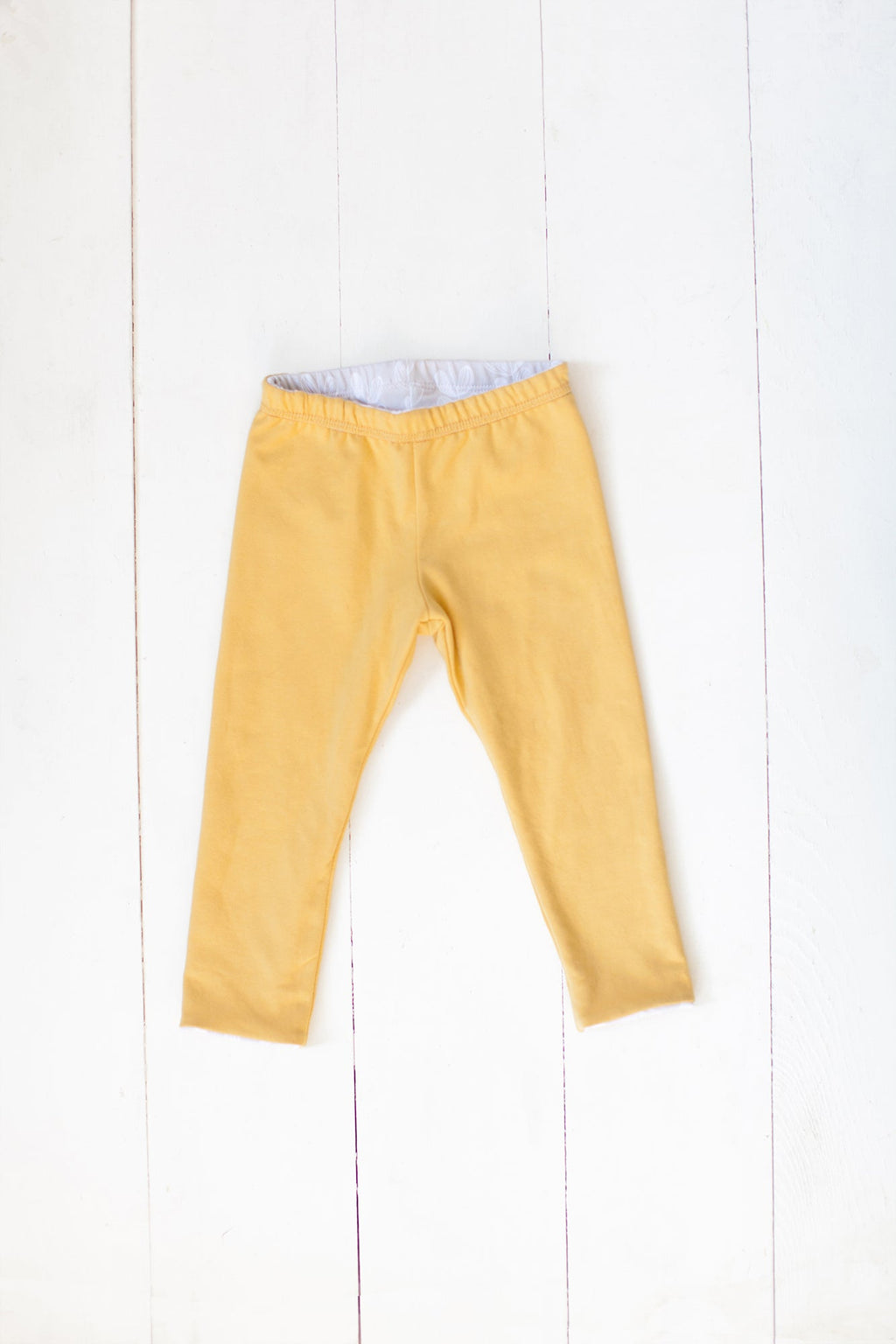 Reversible leggings in frosted leaves/mustard yellow