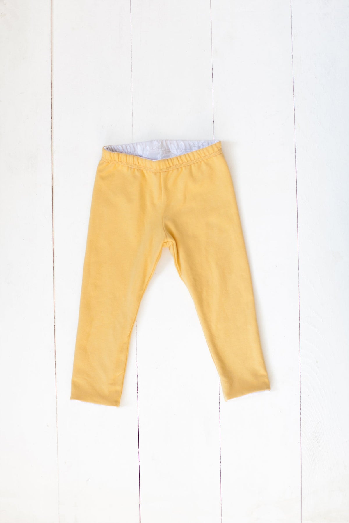 Reversible leggings in frosted leaves/mustard yellow